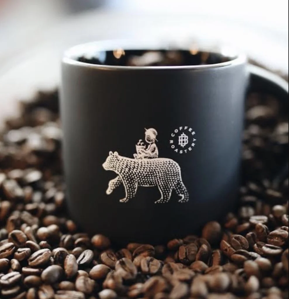 coffee mug on coffee beans The Boy and the Bear