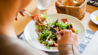 a guy having salad lunch