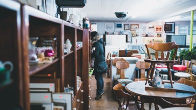 women standing in thrift store