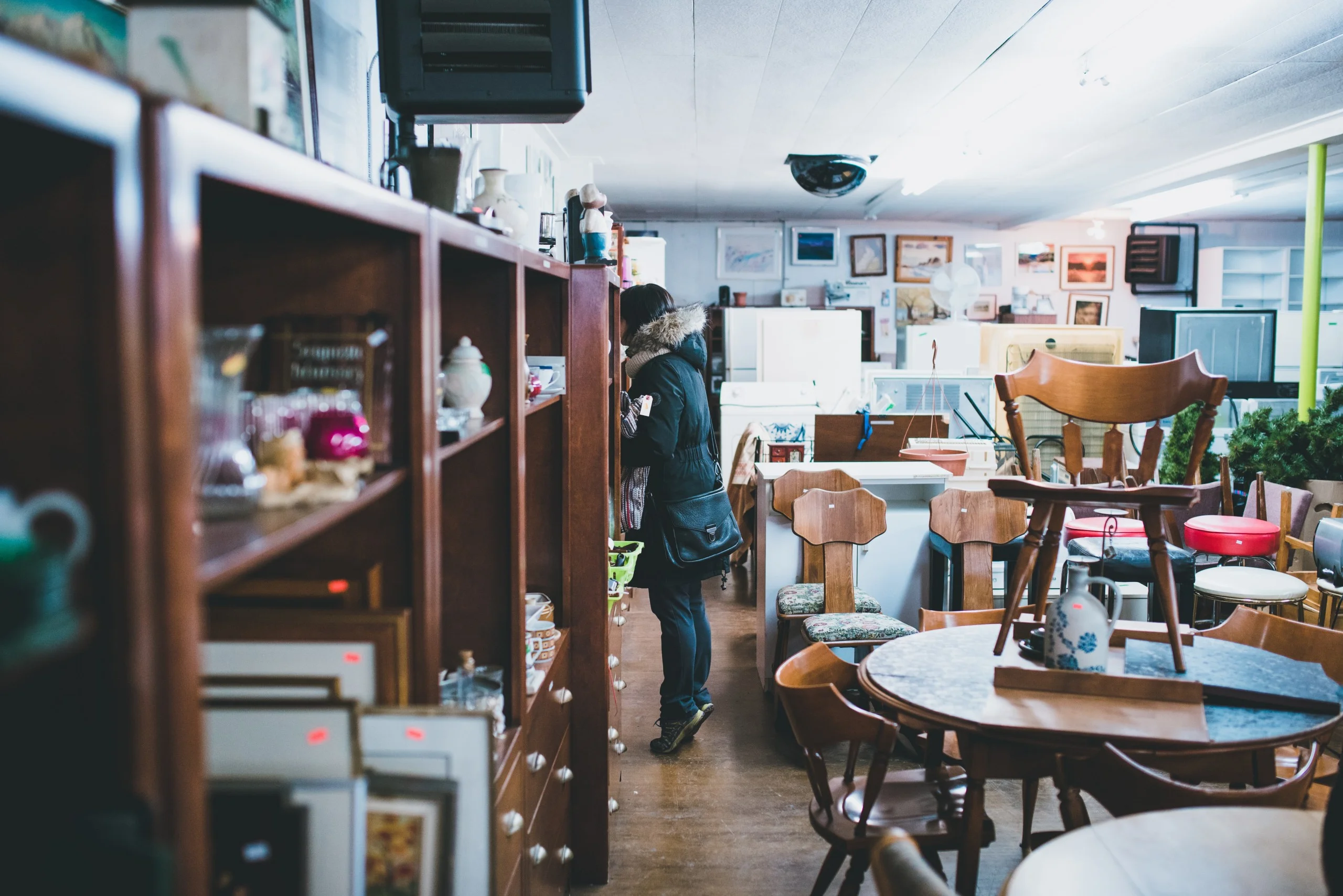 women standing in thrift store