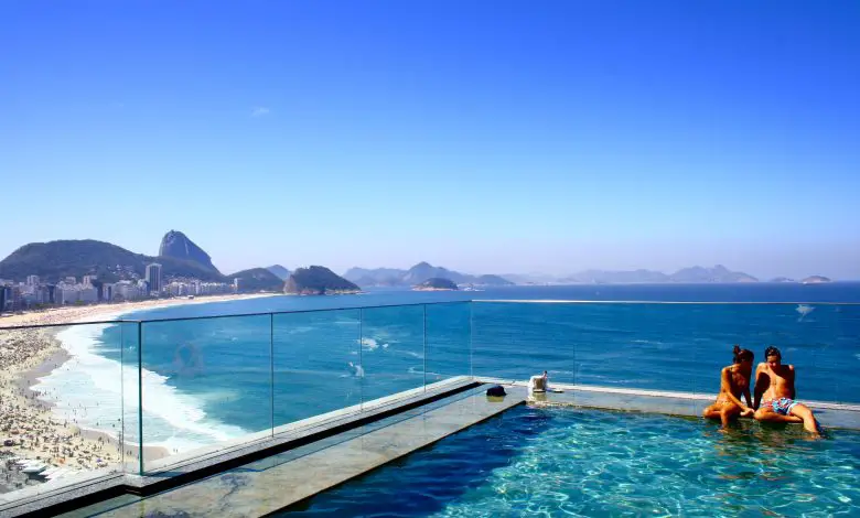 pool in hotel with beach view