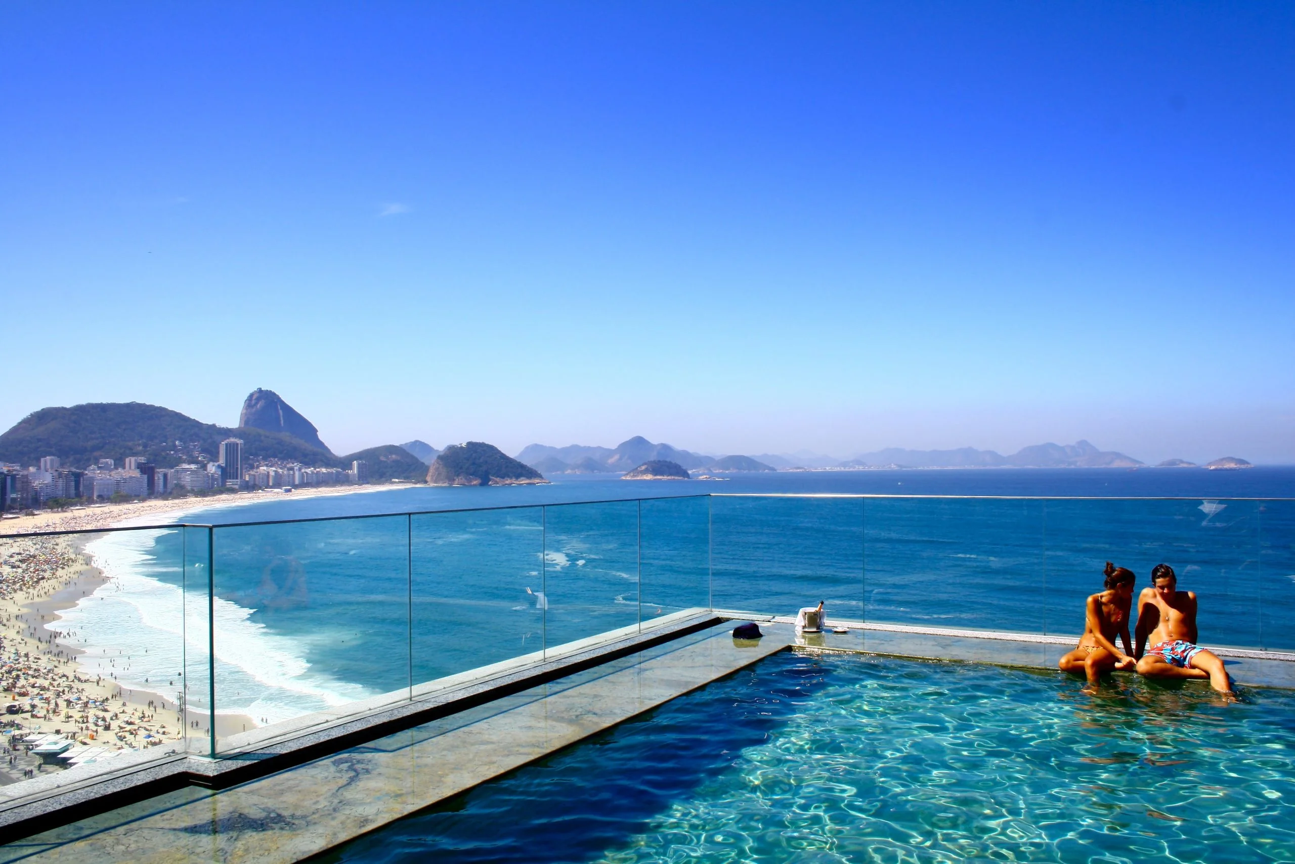 pool in hotel with beach view