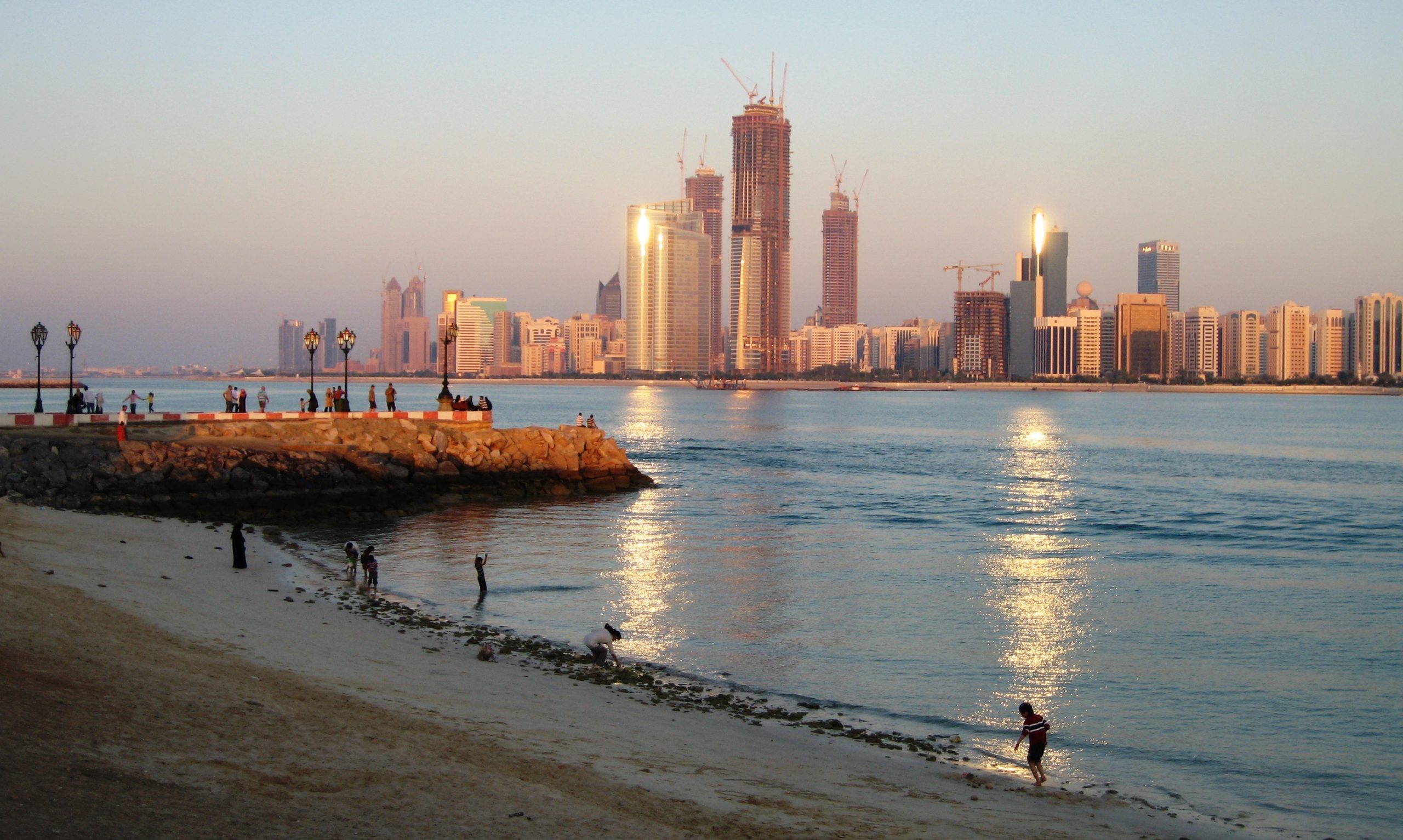Abu Dhabi gleaming in evening light, taken from the Breakwater in the Marina area.