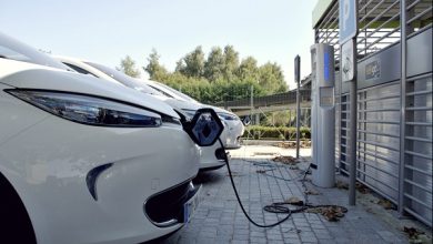 cars getting charged at an ev station