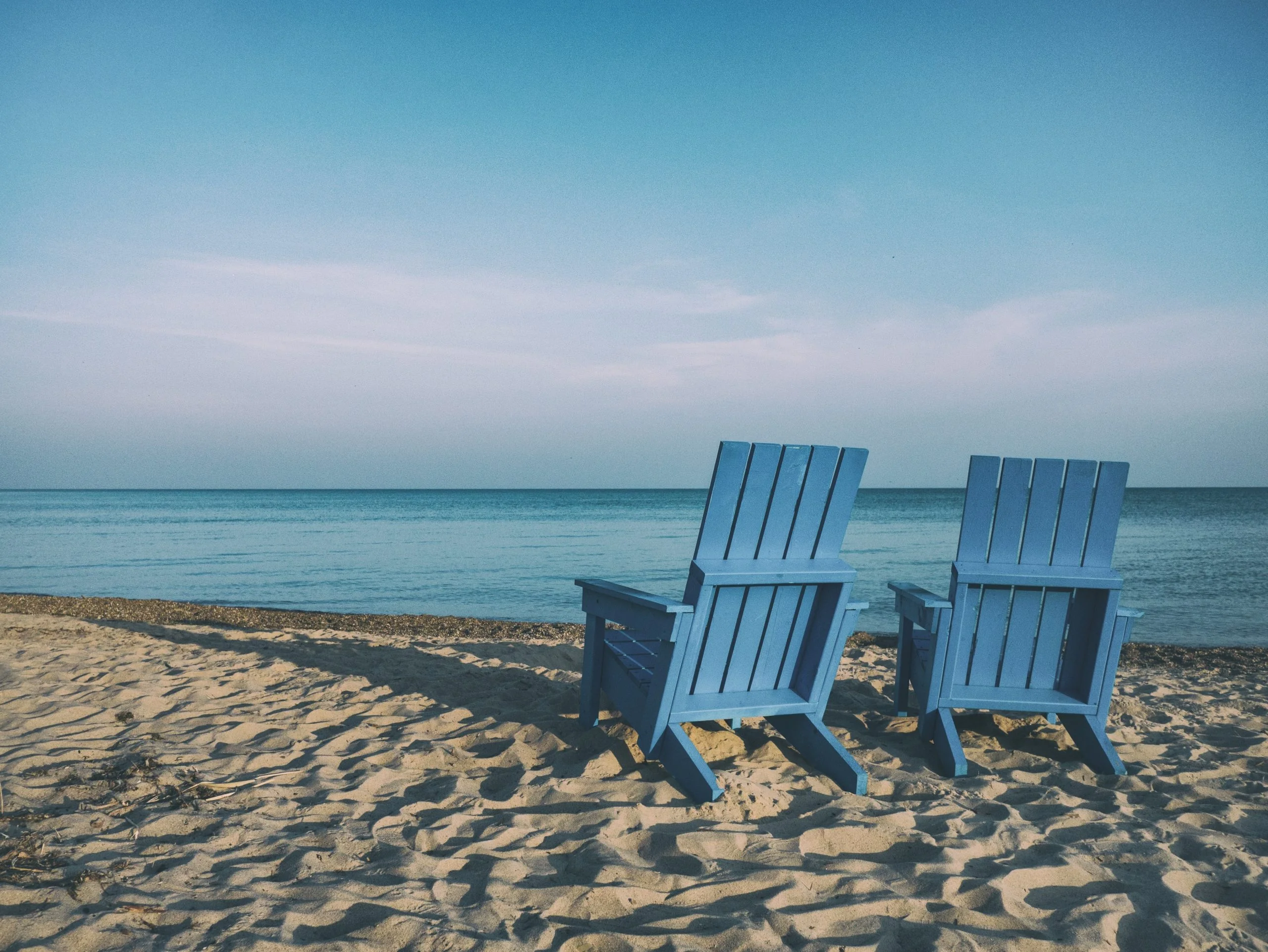 benches on sand at the beach