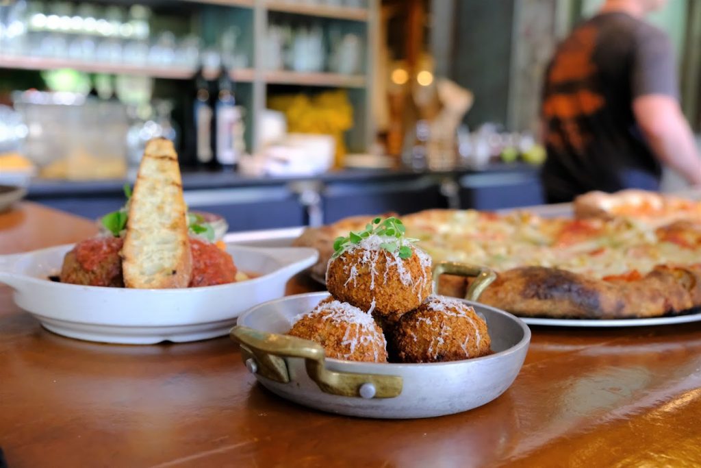 several dishes at Robert’s Pizza and Dough Company