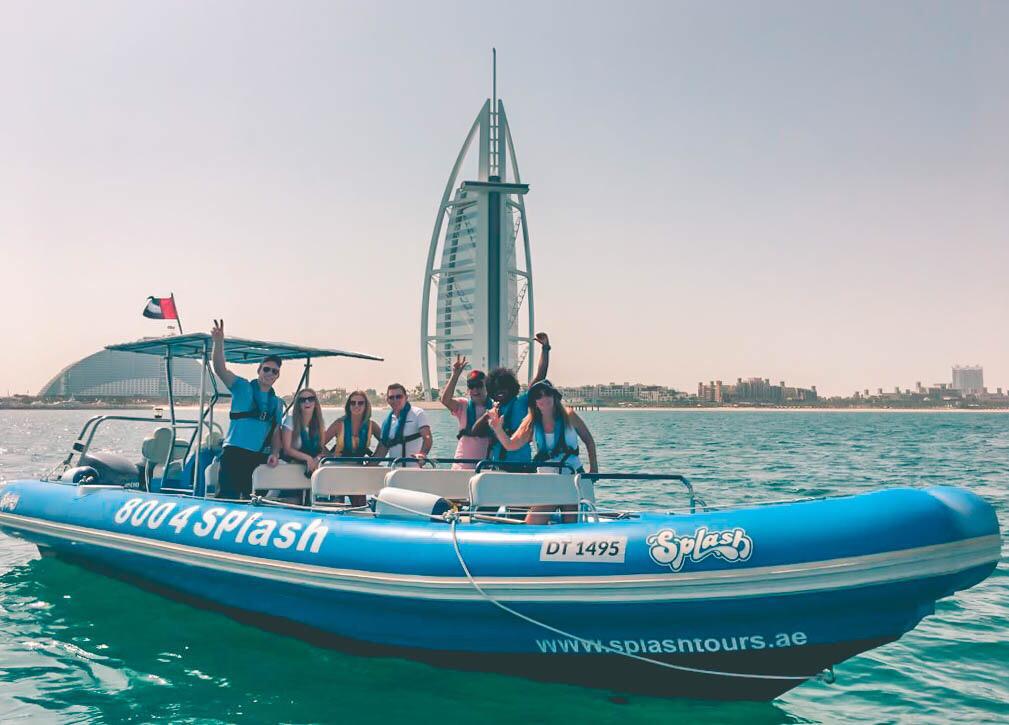 Speedboat tour splash dubai with burj ul arab in background