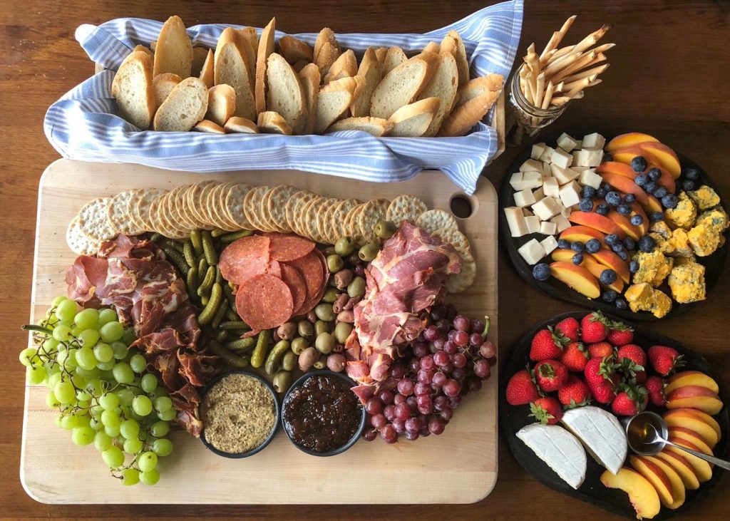 cheeses, charcuterie, olives, crackers, breads, pickles, nuts, dried and fresh fruit 