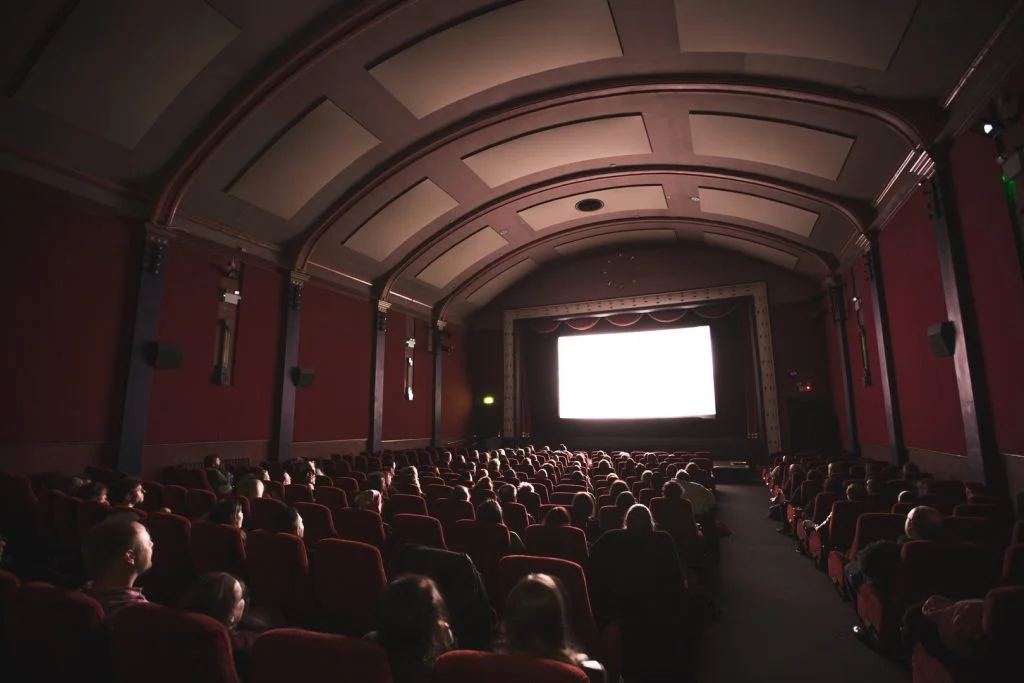 people watching a movie in cinema