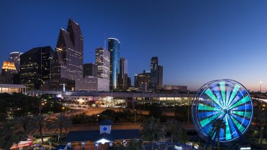 Dusk shot of Houston, taken from the Downtown Aquarium. The spinning wheel at the right is the aquarium's Ferris wheel