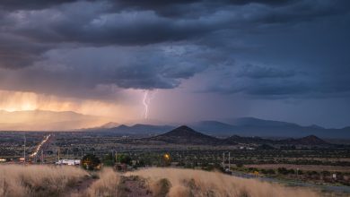 Lightning striking the Santa Fe mountains during monsoon season in New Mexico.