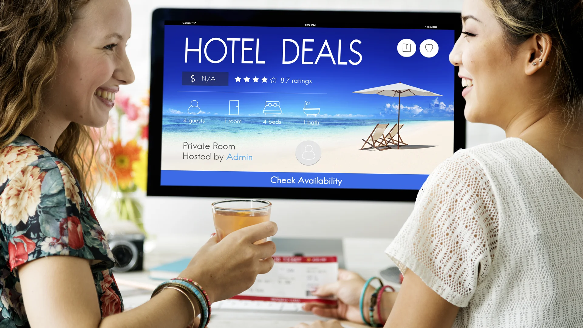 Two women looking at hotel deals