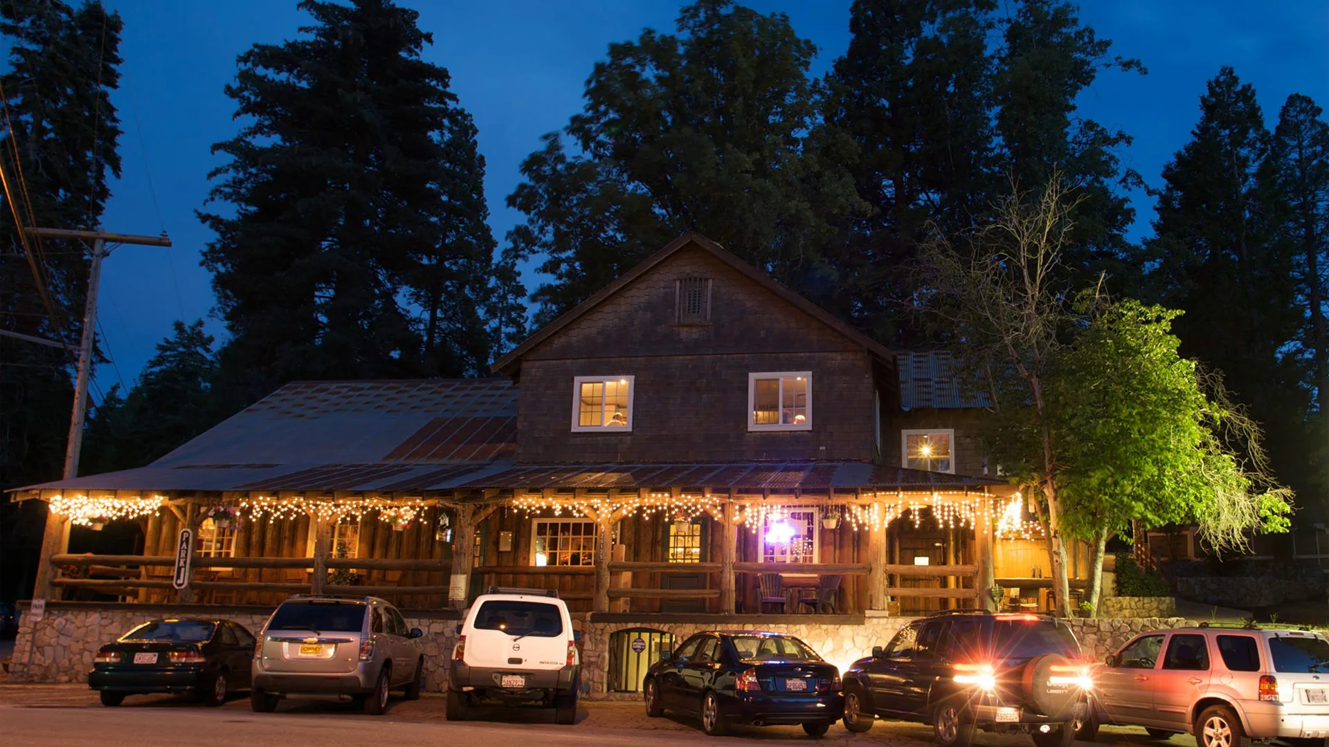 Cars parked outside The Grill at Antler's Inn