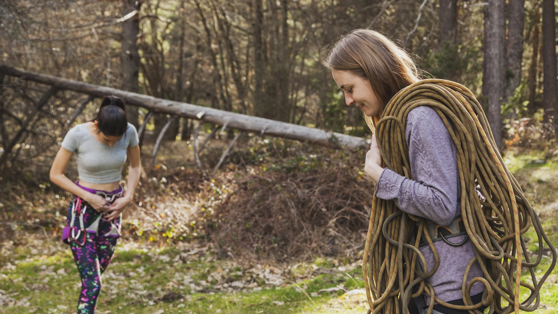 girl holding rope in wild