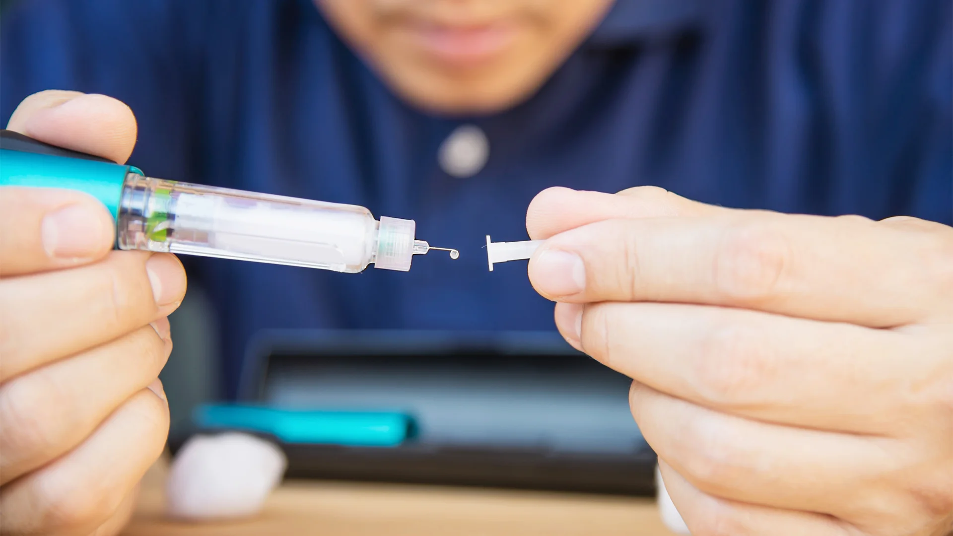 Doctor holding a syringe