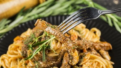 Meat and pasta with fork