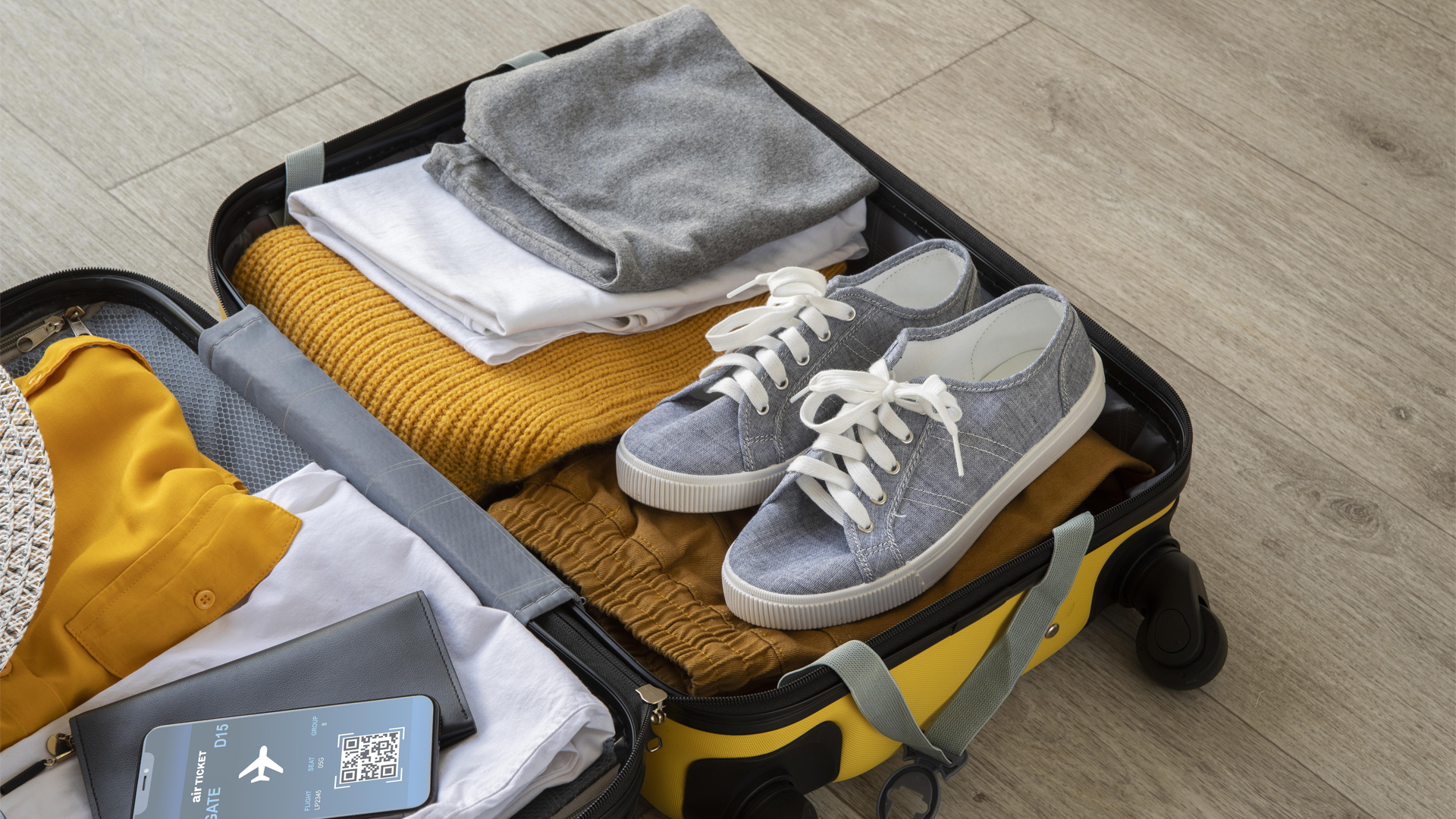 Clothes and shoes in a travel bag