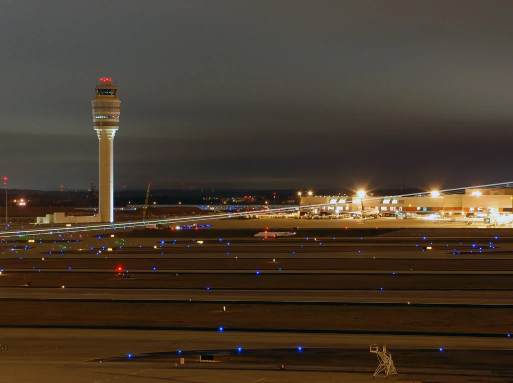 atlanta international airport at night runway illuminated