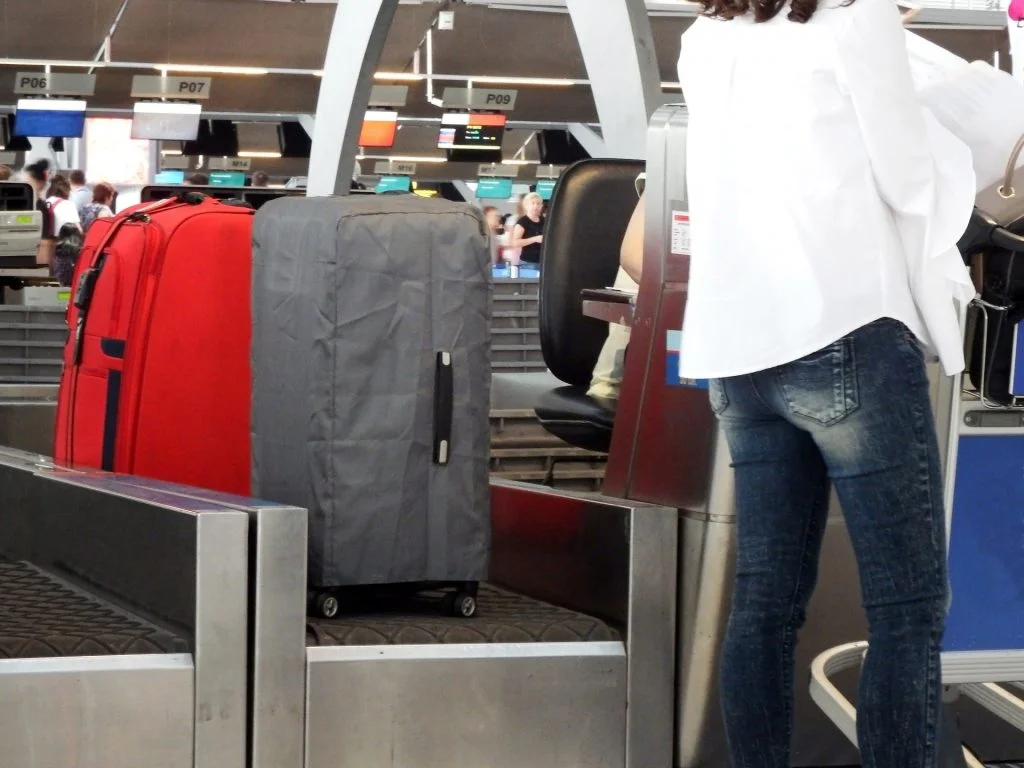 checking in baggage at an airport