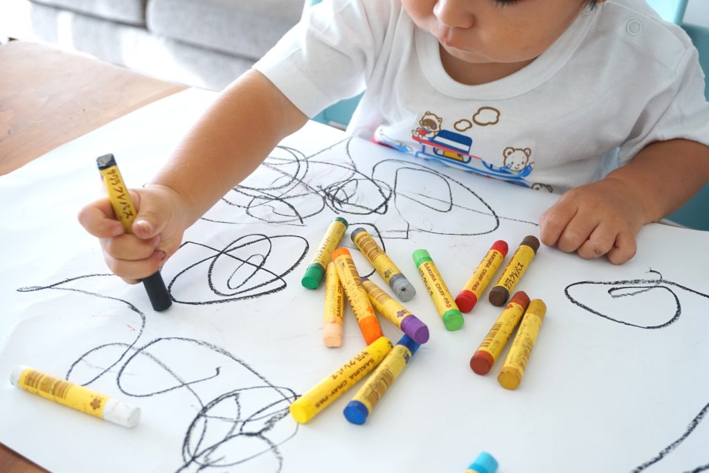 kids drawing with crayons creativity
