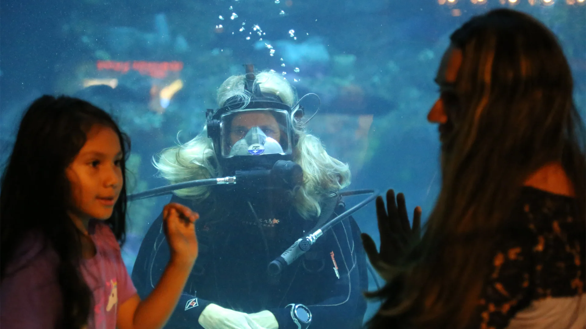 Little girl with mother at the North Carolina Aquarium at Fort Fisher