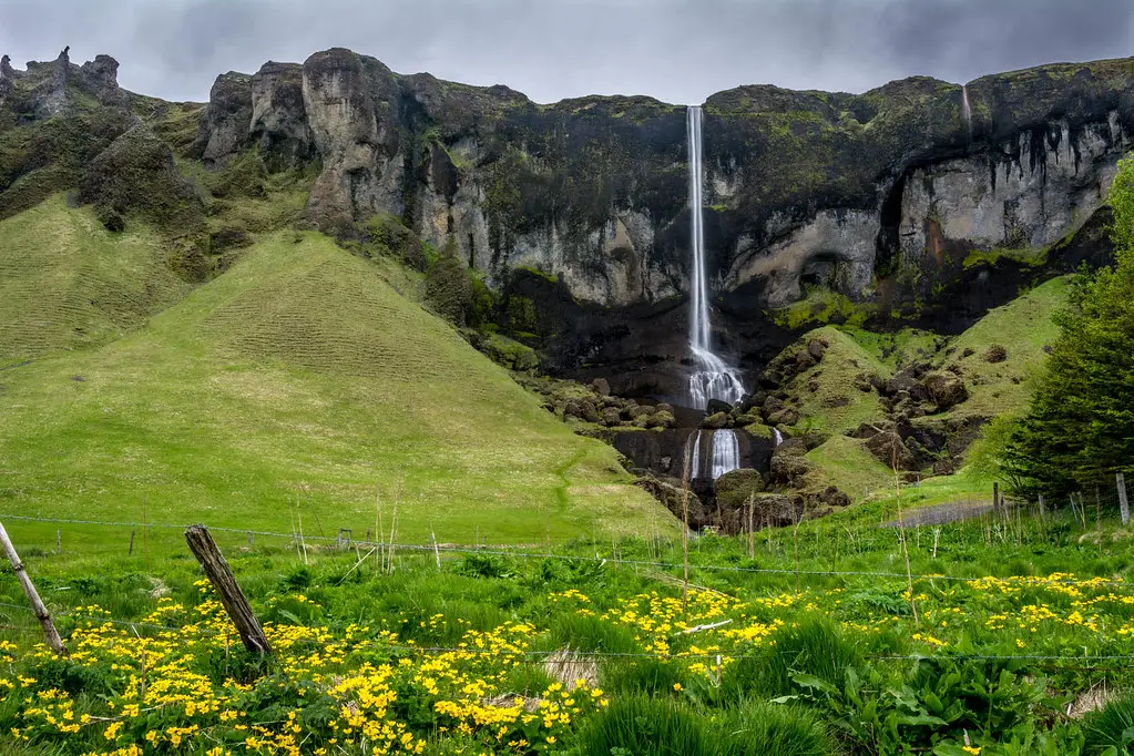 A scenic view of Foss á Síðu Waterfall