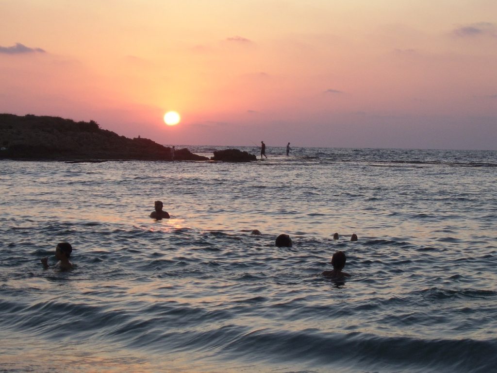 Swimming Sunset Beach