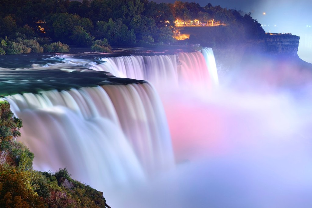 Colorful Niagara falls during evening.